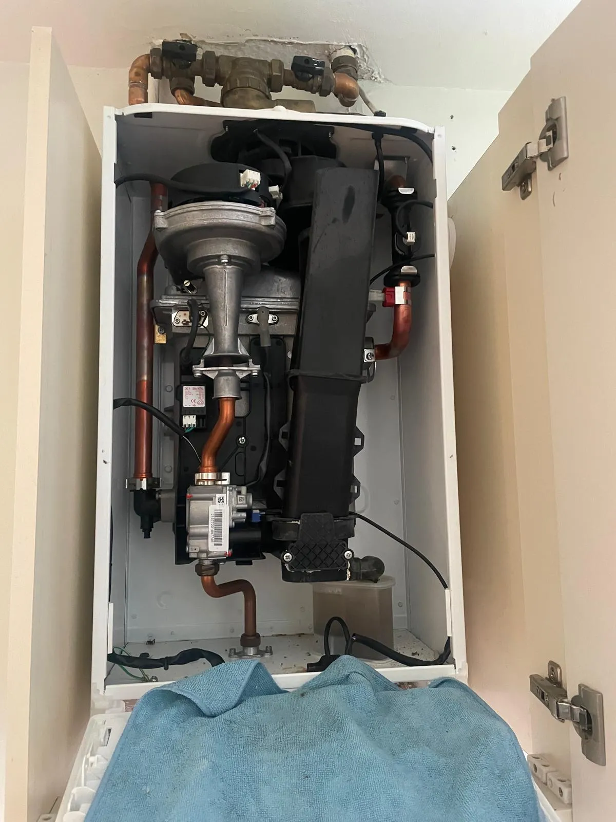 Blue Towel next to boiler